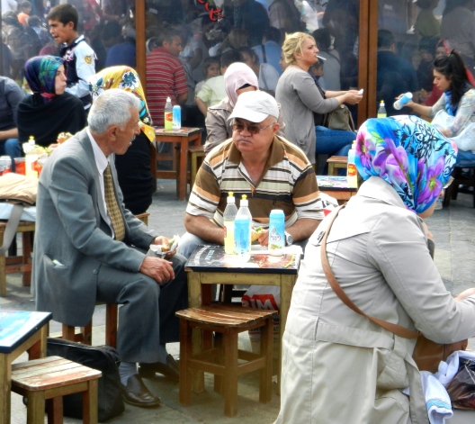 Turkish men love to enjoy lunch at these little tables set up around town